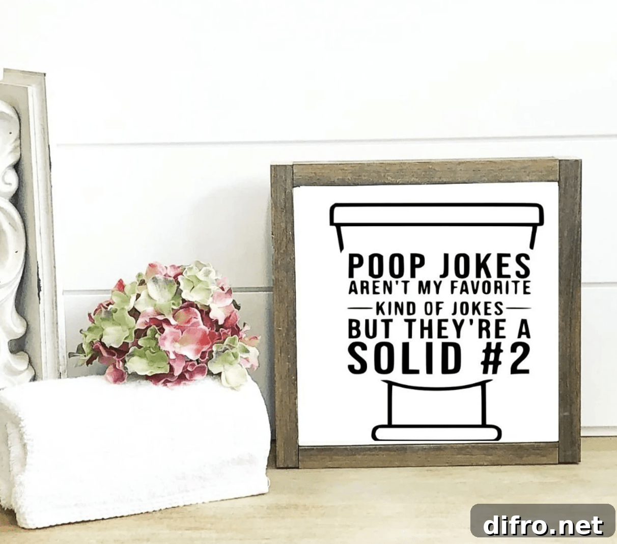 poop jokes rustic wood frame bathroom sign white shiplap background flower towel