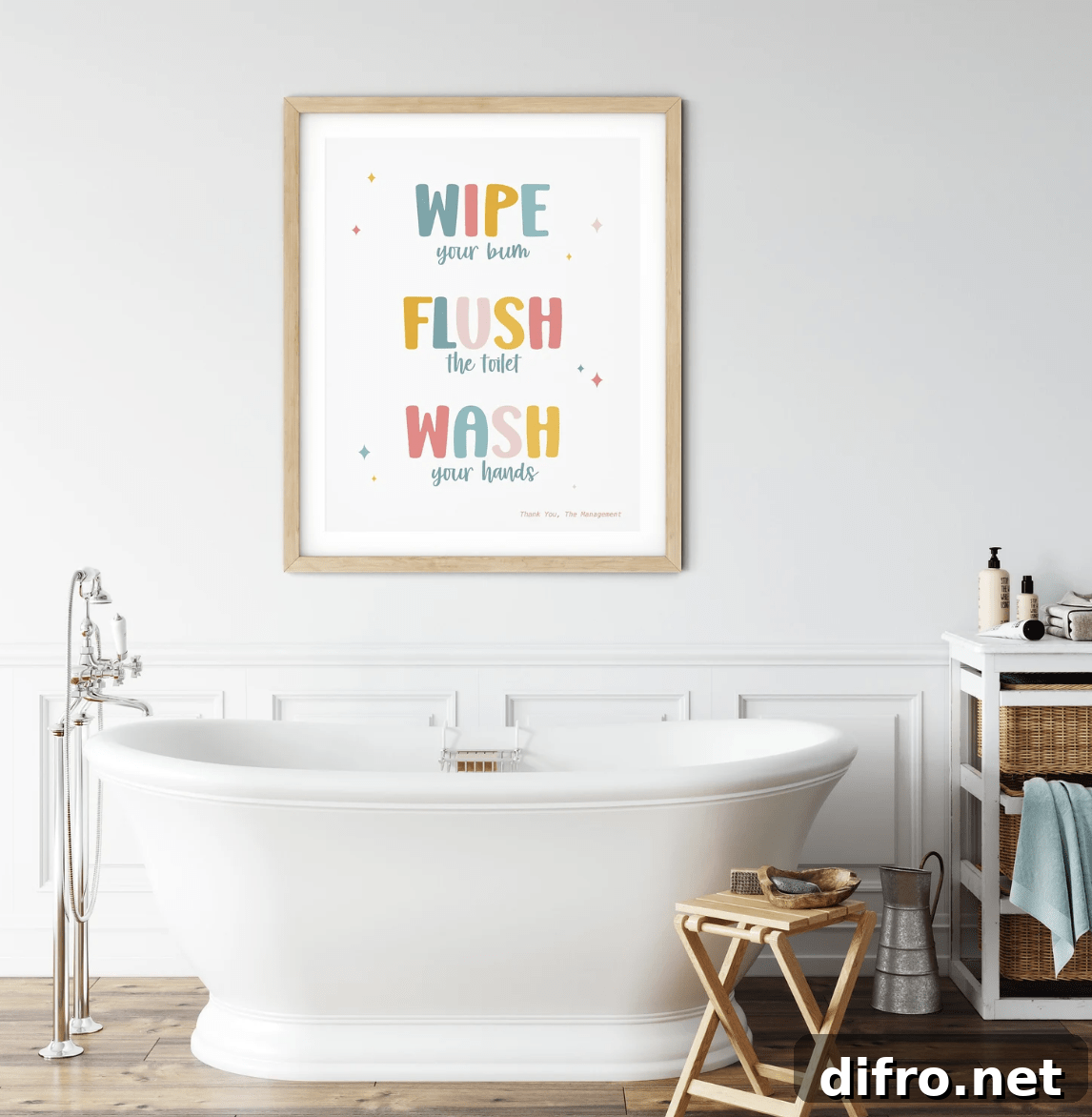 wipe flush wash kids colorful bathroom sign hanging over white freestanding tub with chrome faucets=