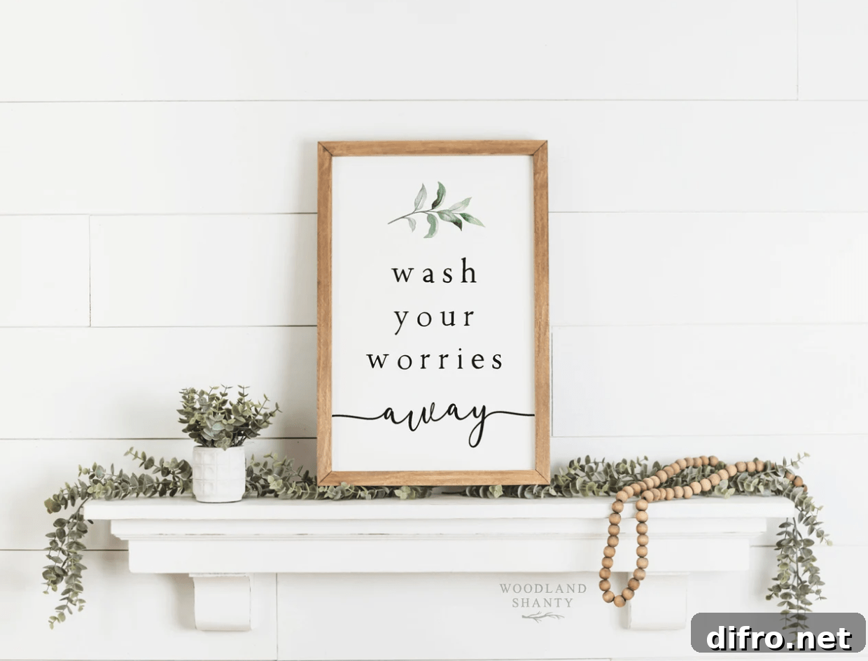 wash your worries away rustic light wood sign on shiplap white background with greenery garland and wood beads hanging shelf farmhouse