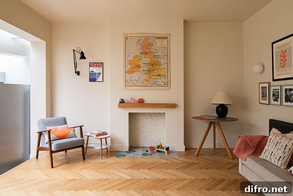 Elevated family area with herringbone wood flooring and white walls