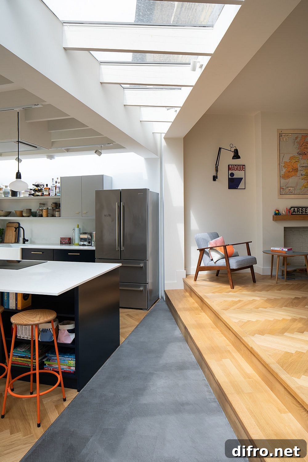 Raised interior level that separates living and dining spaces subtly