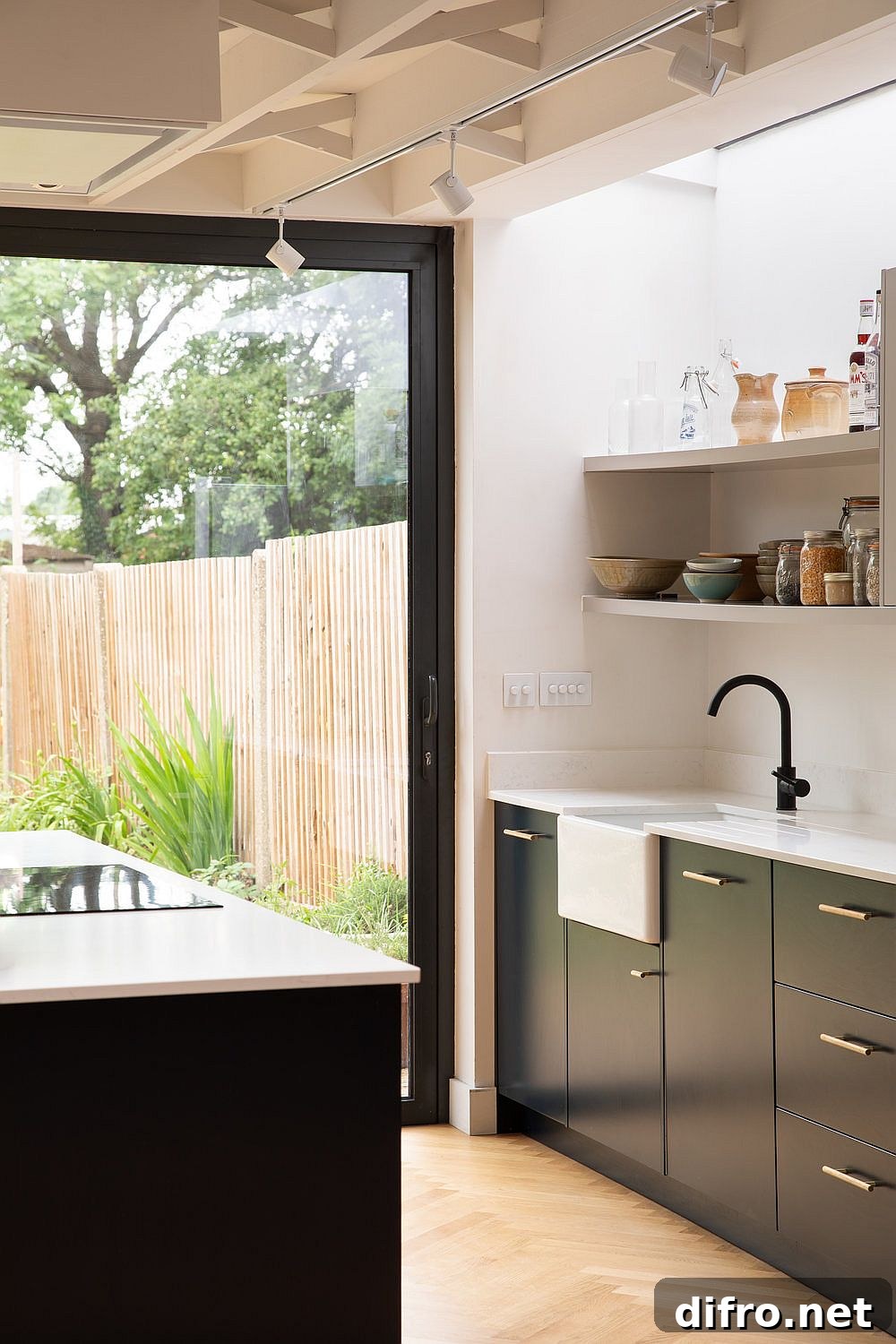 Contemporary kitchen visually connected to the living area