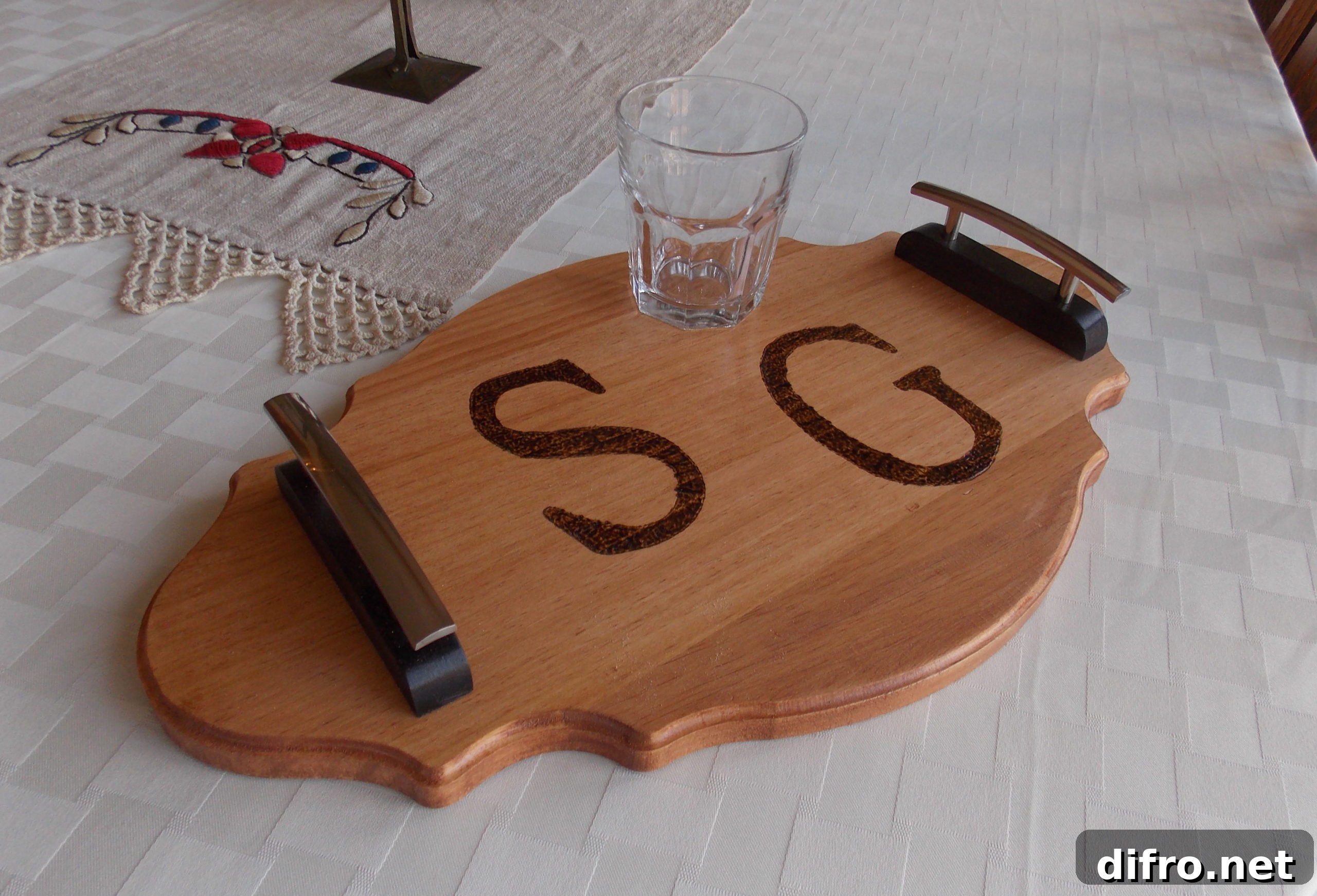 Glass on top of monogrammed wood tray with side handles