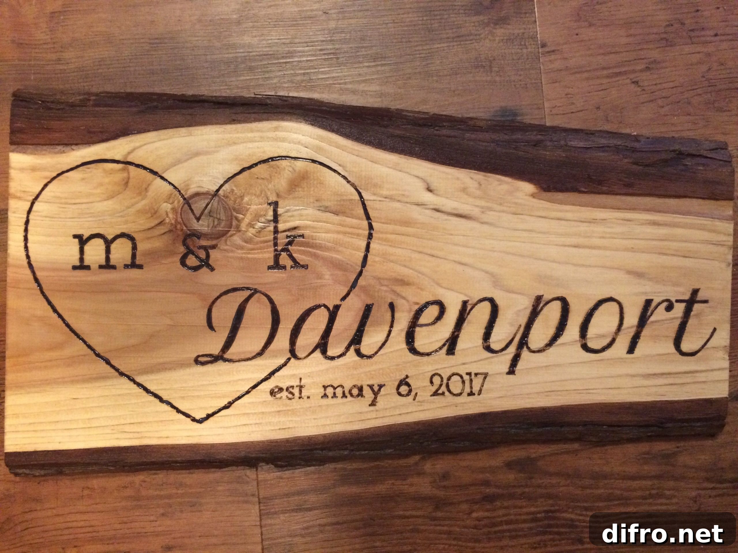 Wood wedding sign with a large heart