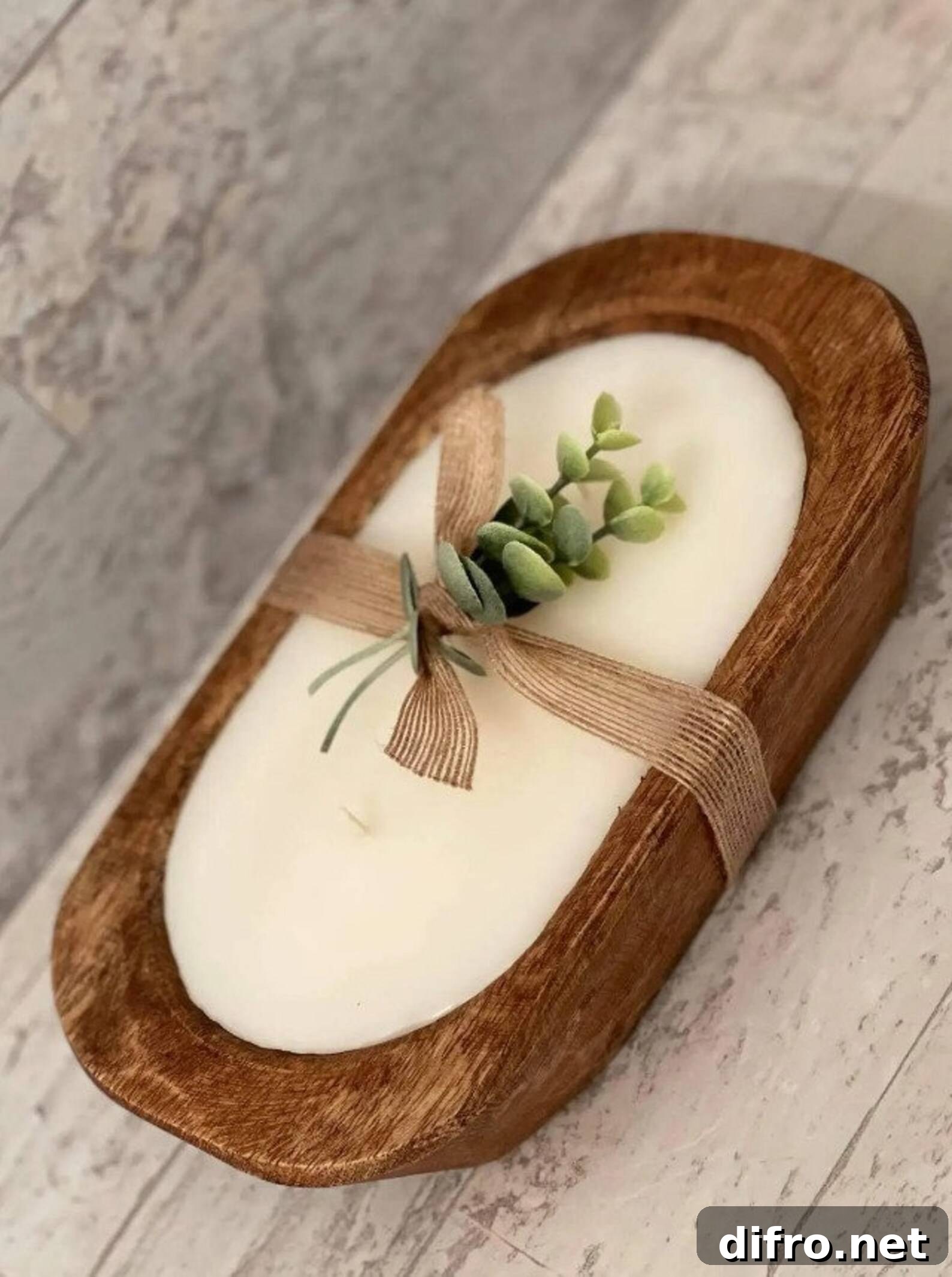 wood dough bowl candle with greenery