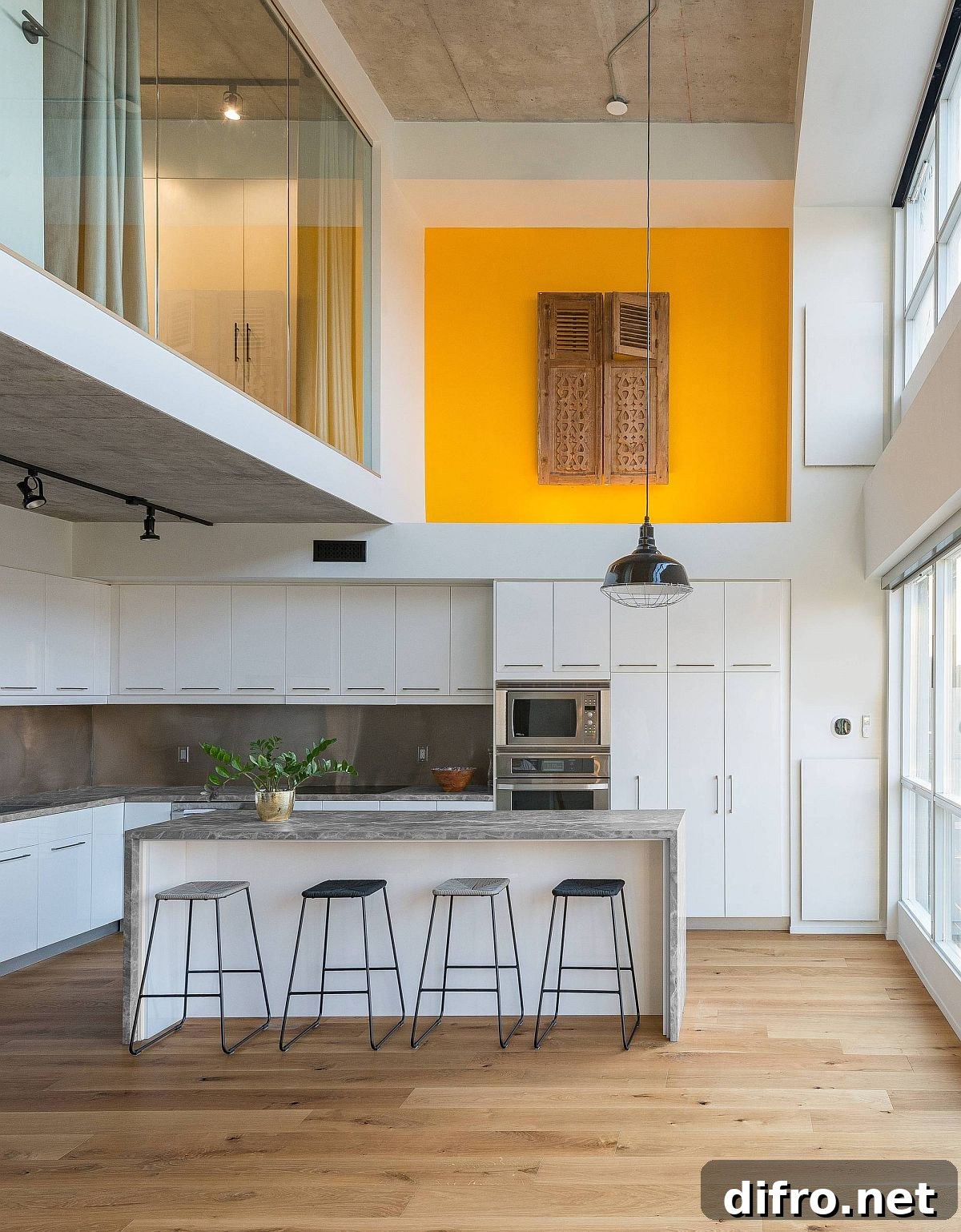 Fabulous contemporary kitchen with double-height design and a splash of yellow