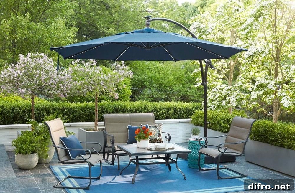 Blue cantilever umbrella over metal chairs and tables