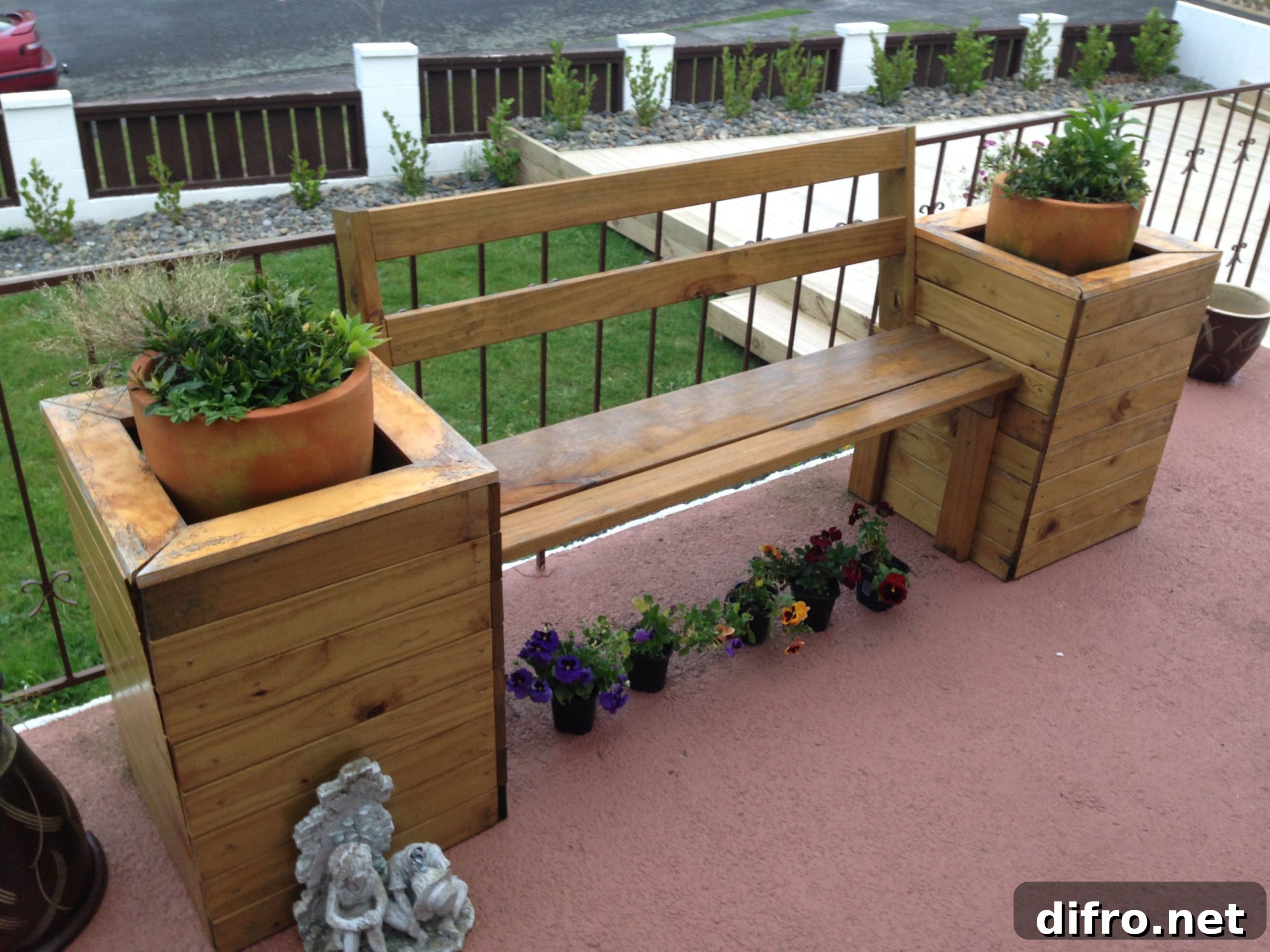 wooden bench with attached planter