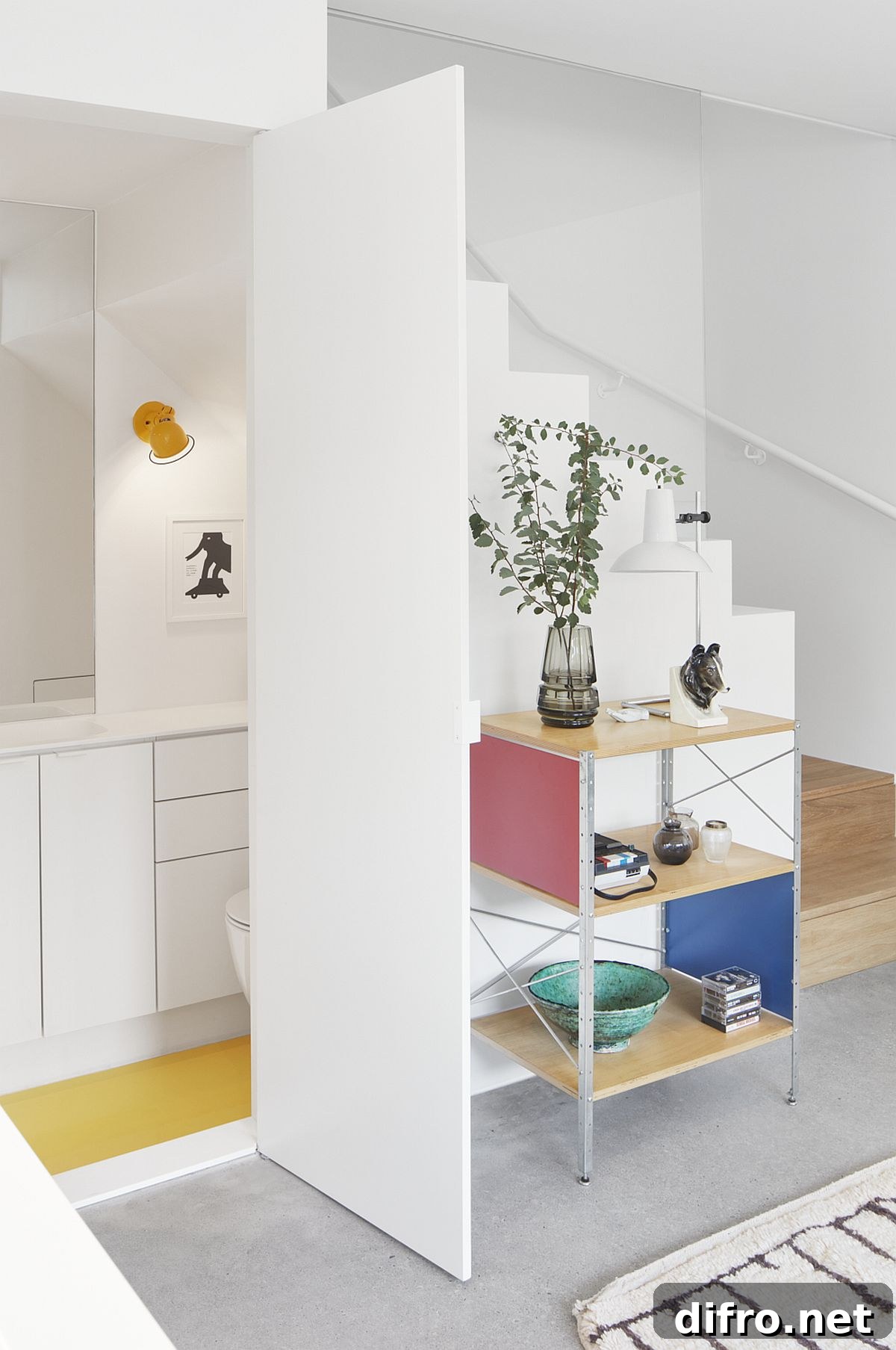 Space-savvy interior design of the home with white and wood shaping the backdrop