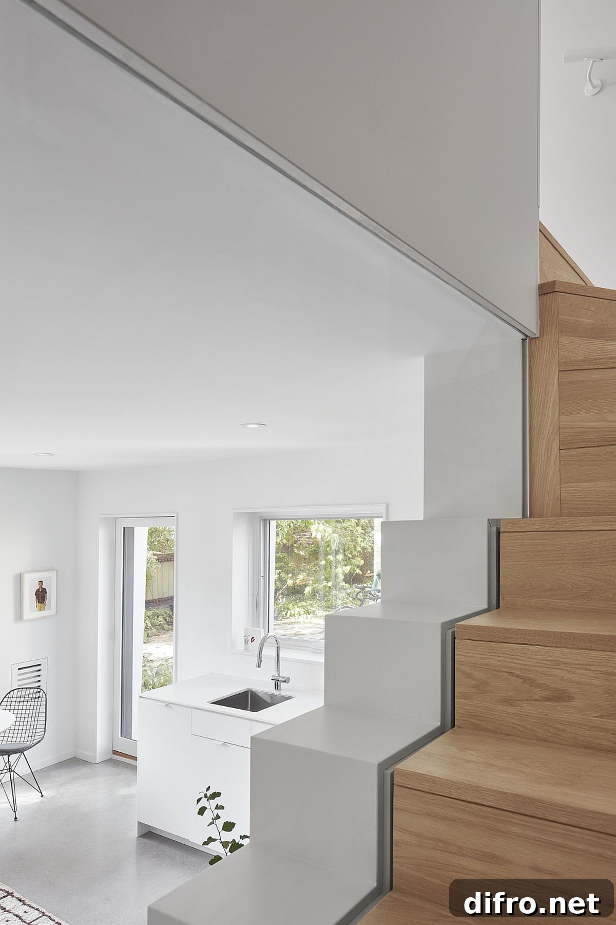 Woodsy staircase leads to the gorgeous upper level with bedrooms