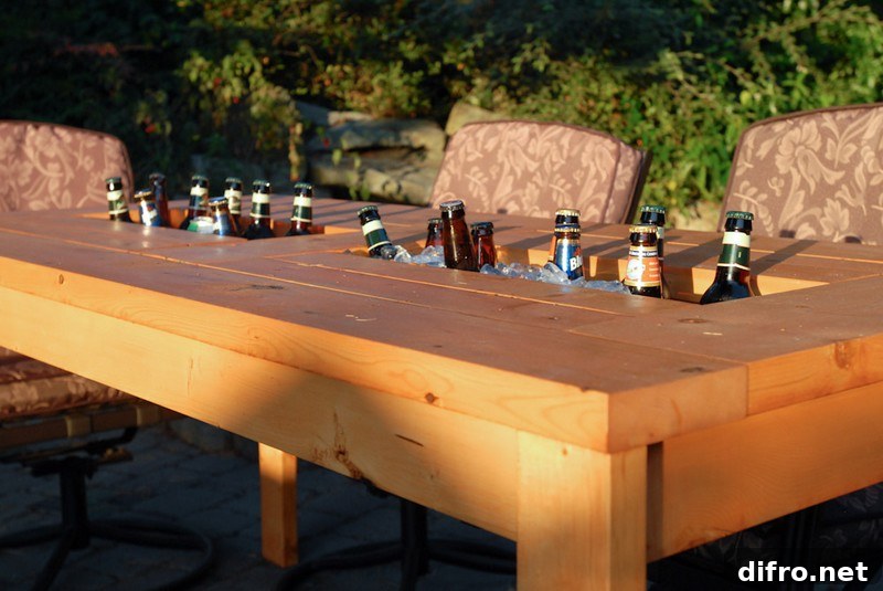 wooden table with built in drink storage