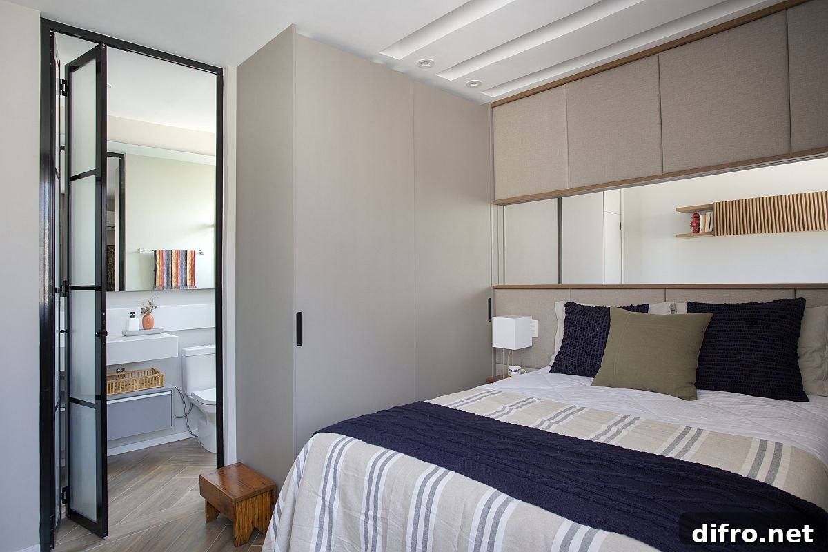 Renovated bedroom with bathroom that has a relaxing modern vibe