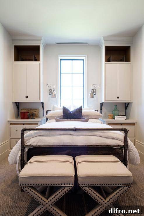 cupboards over nightstands in bedroom seats at end of bed window in middle