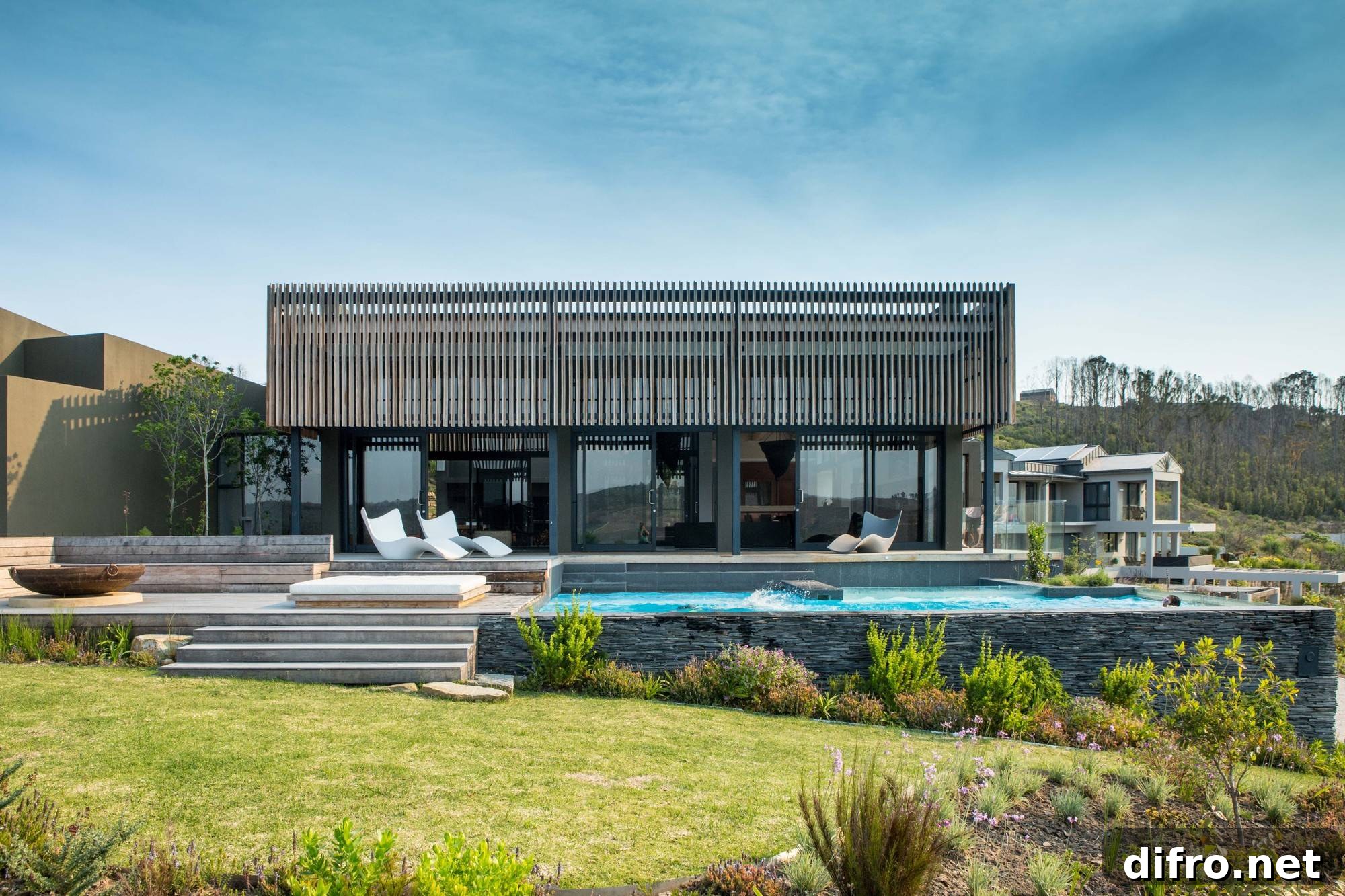 Imbizo House exterior and pool area designed by KSR Architects