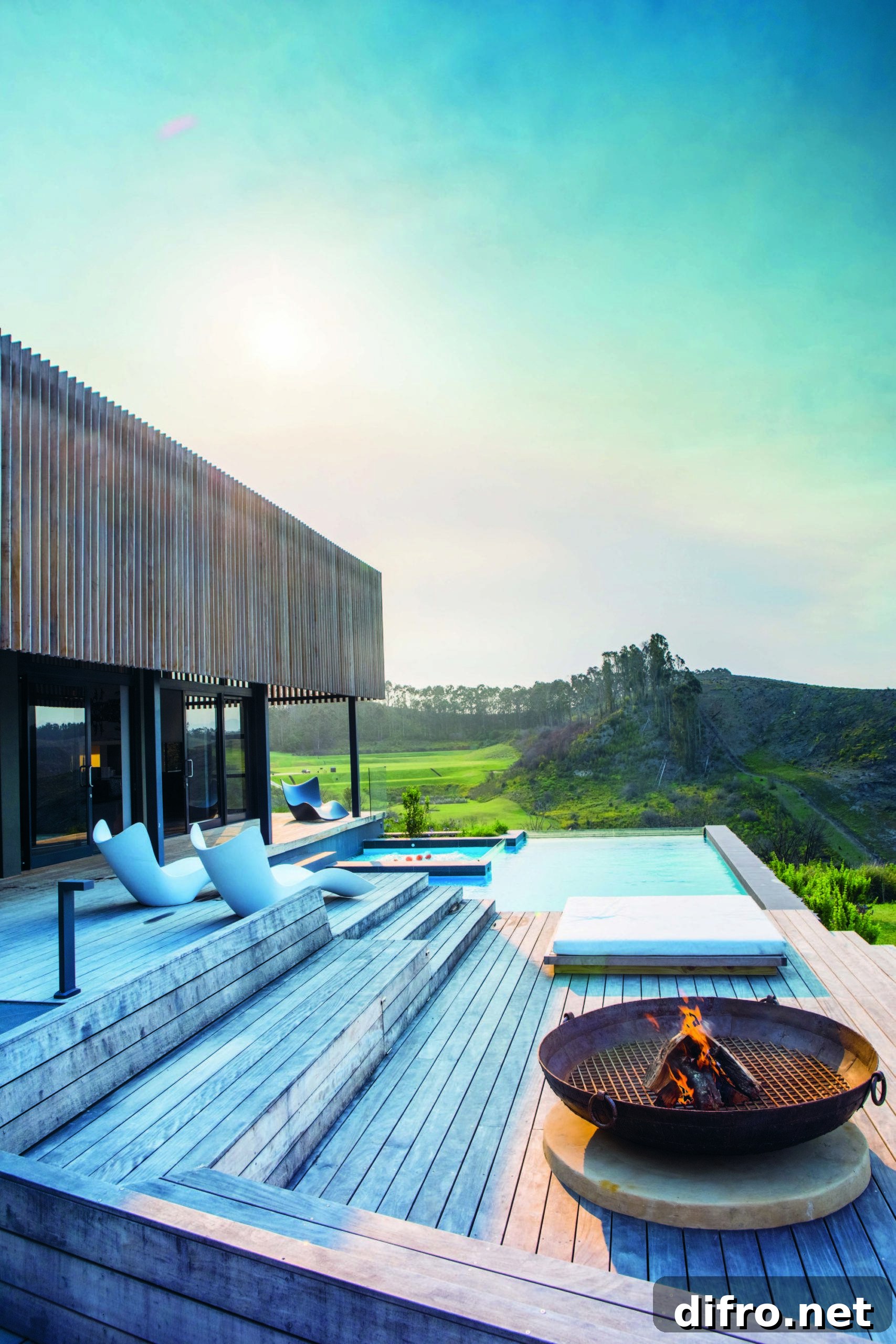 Large wooden deck and pool area at Imbizo House for social gatherings