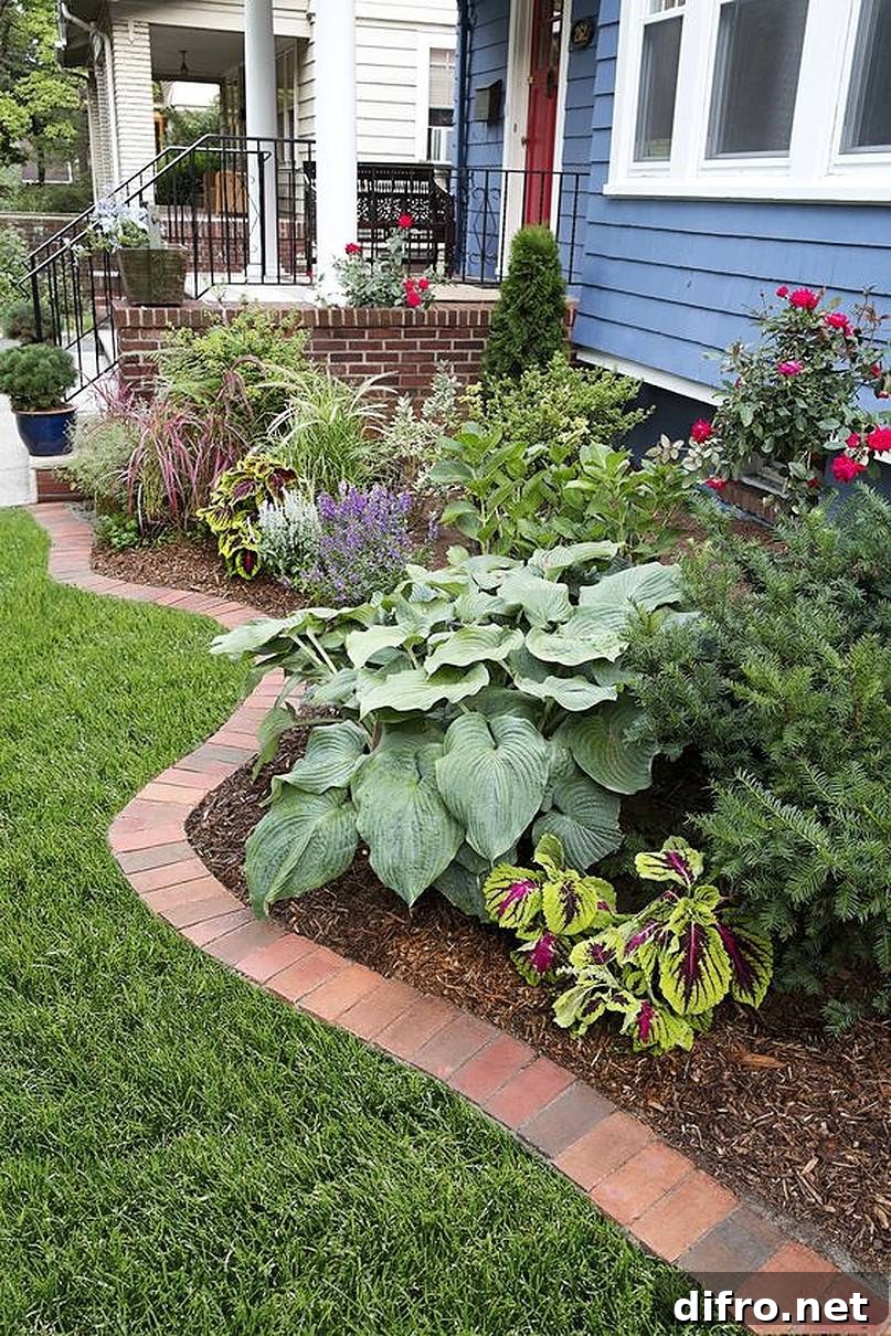 36 Lawn Edging Ideas to Define Your Yard 11 Flower bed in front of white window