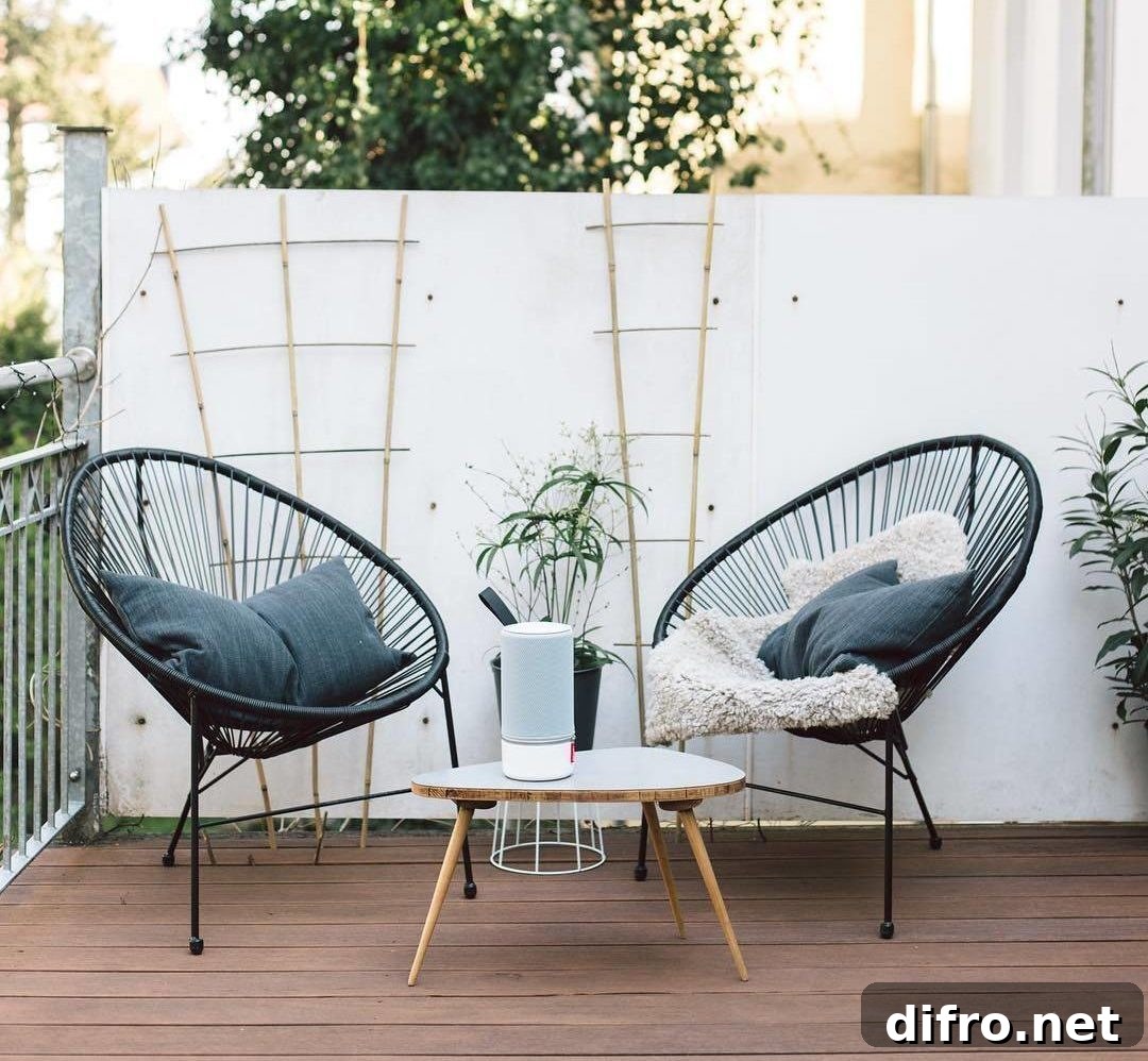 Acapulco Black Wicker Statement Accent Patio Chair Outdoor Decor Modern Oblong Coffee Table
