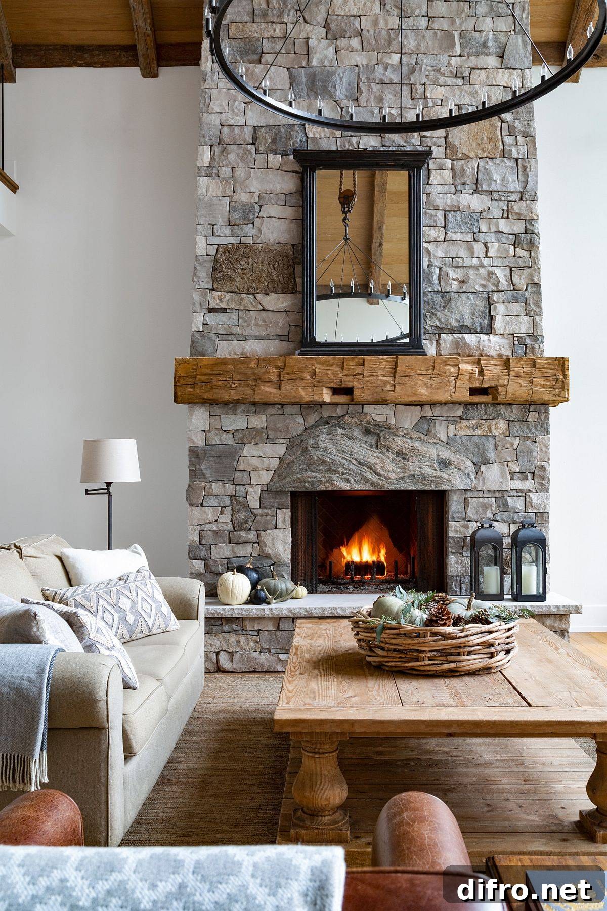 Stone fireplace becomes the focal point in this gorgeous farmhouse style fireplace