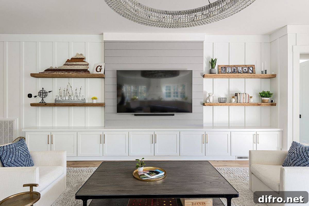 Gray and white farmhouse living room with modernity thrown into the mix