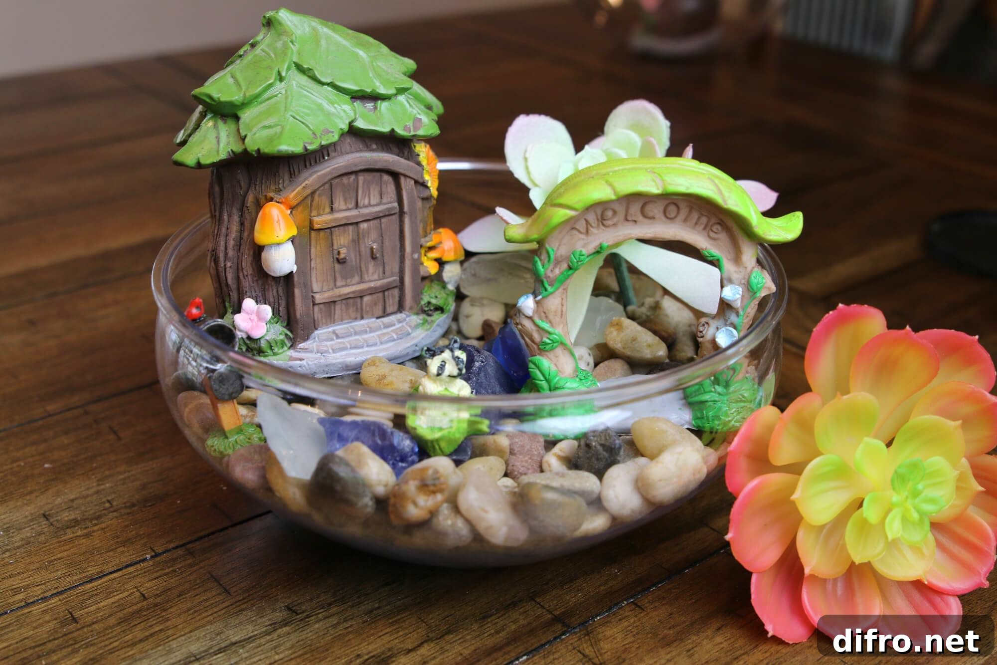 House and pebbles inside a clear glass