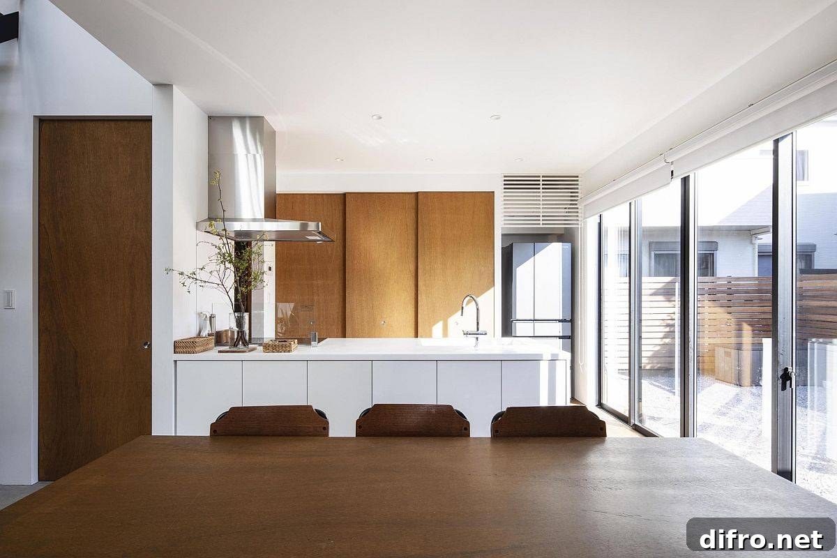 Kitchen and dining with sliding glass doors