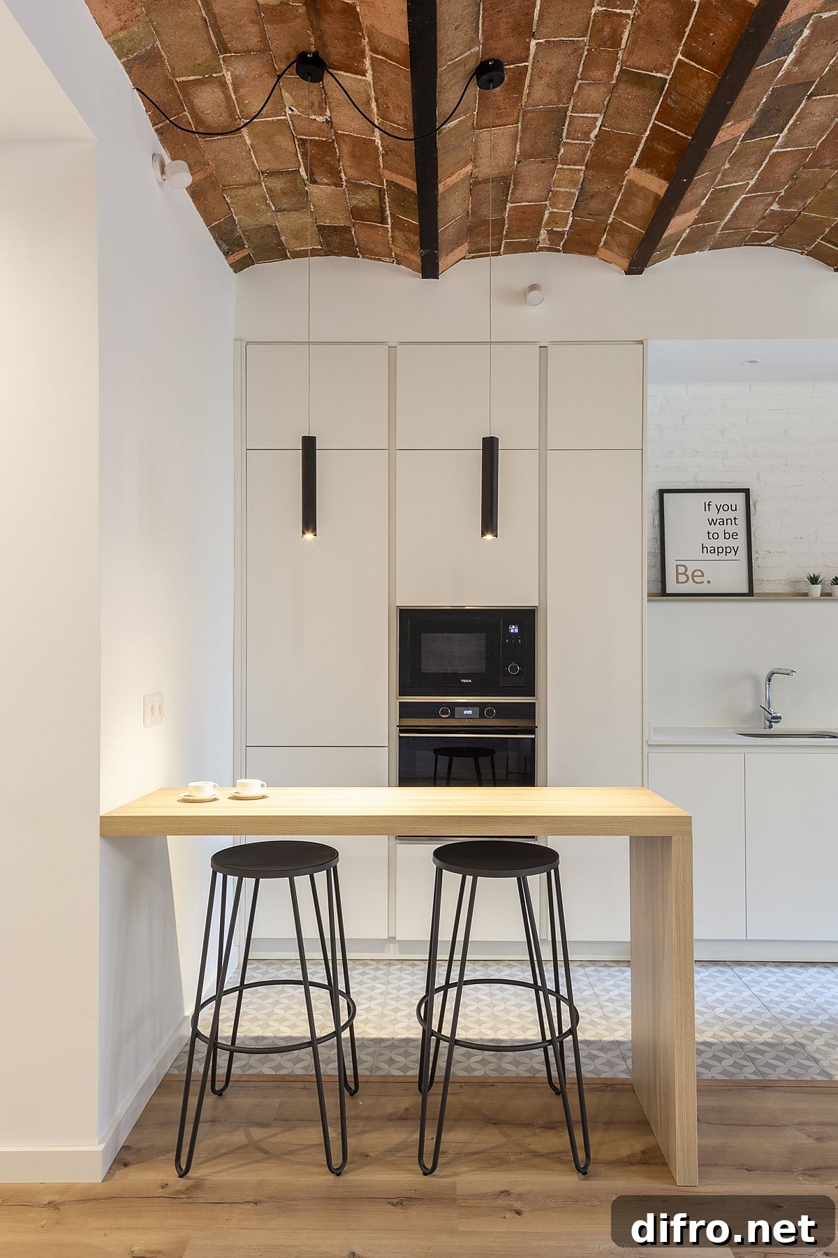 Modern white and wood kitchen in Barcelona