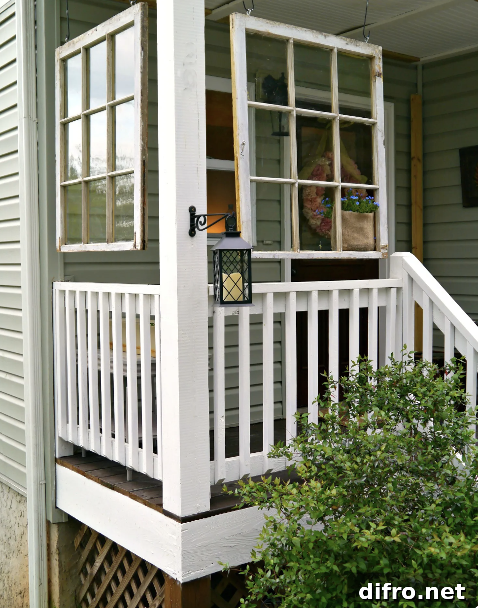hanging old windows on front porch white rail lantern