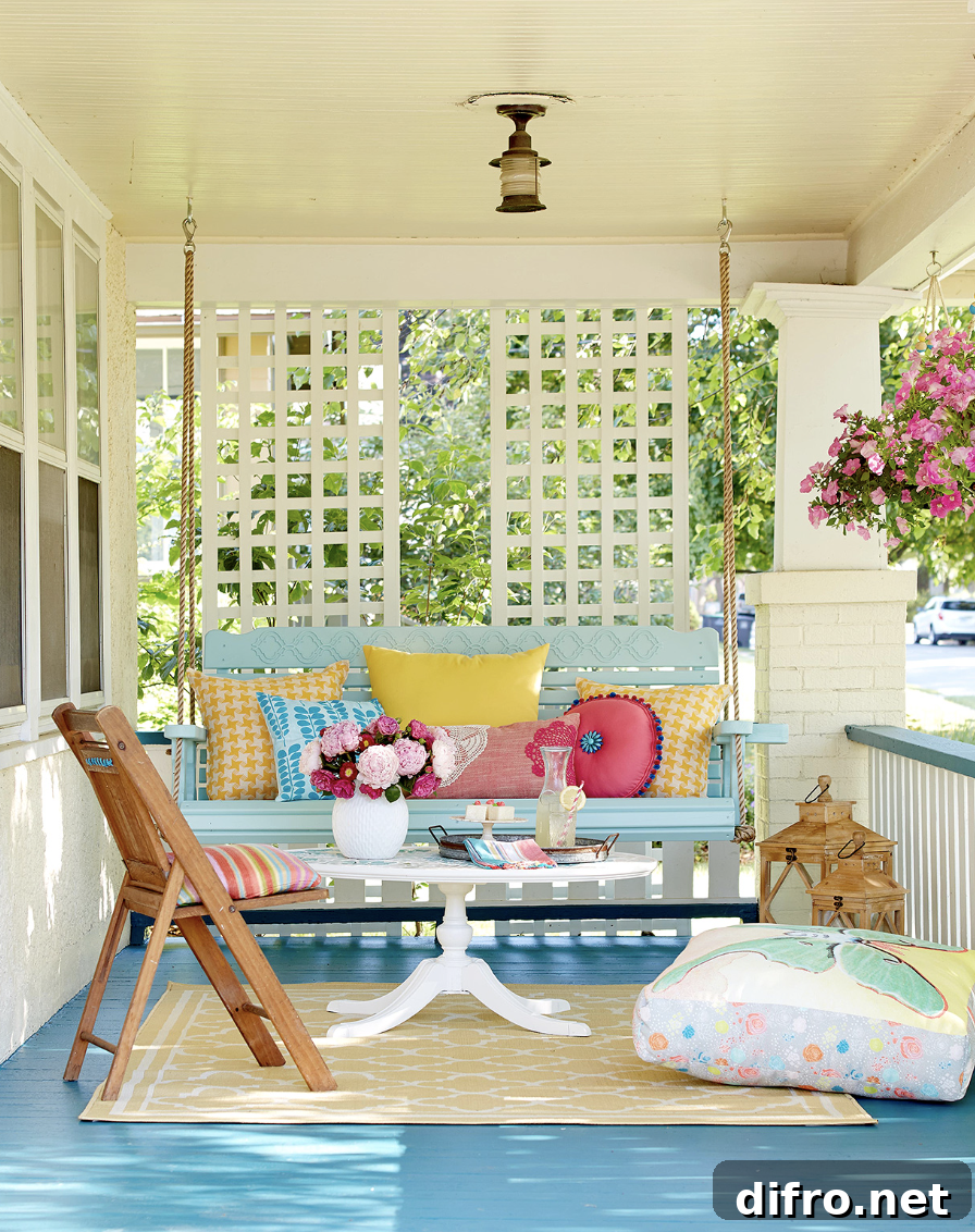 bright colored patio furniture on front porch floor pouf hanging swing lantern coffee table folding chair