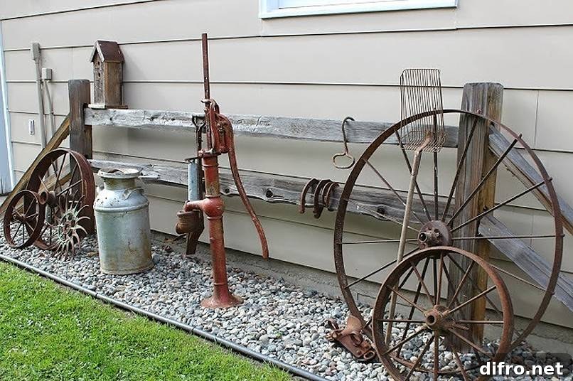 Vintage wheels, pump and jar on gravel