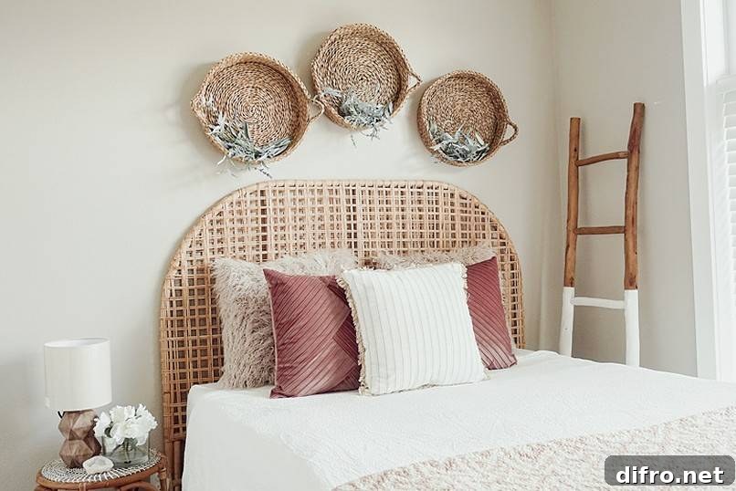 Wood ladder beside bed with wicker baskets