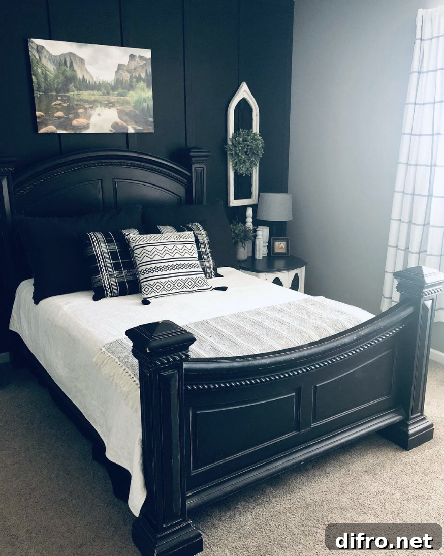 Black farmhouse bedroom with white bedding