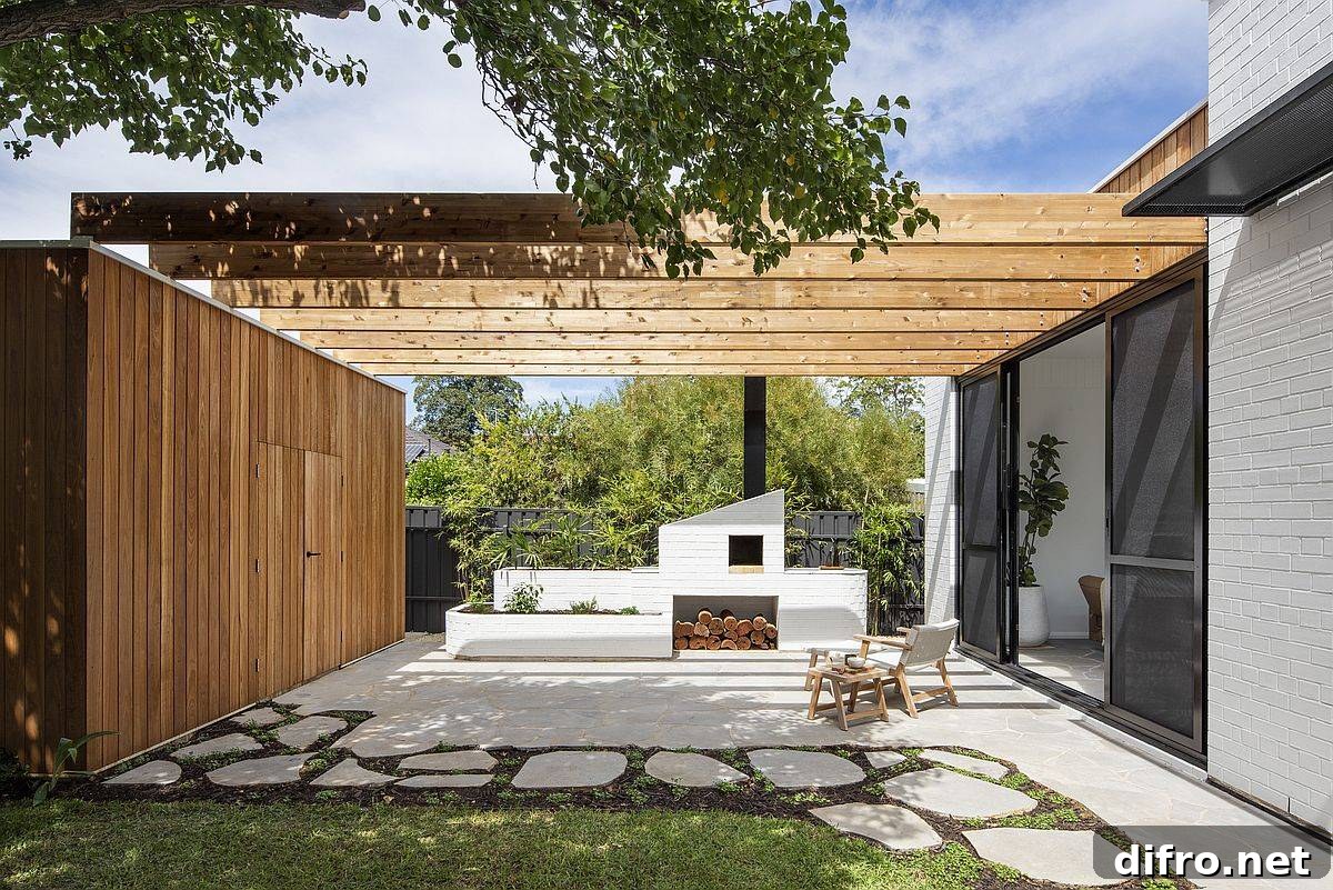 Sheltered entrance with wooden screen and beams