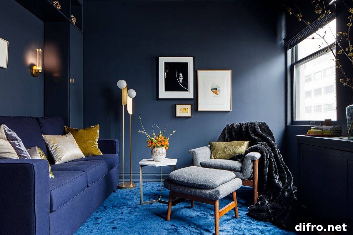 Stunning contemporary living room with dark bluish gray walls, blue carpet and dark blue sofa