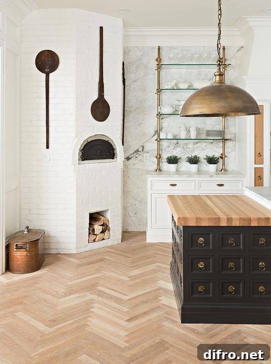 Corner pizza oven beside brass and glass shelves on a marble backsplash wall.