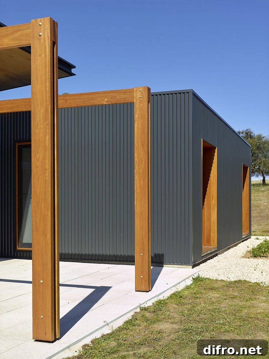 Gray corrugated steel, timber and recycled brick bring green goodness to this home
