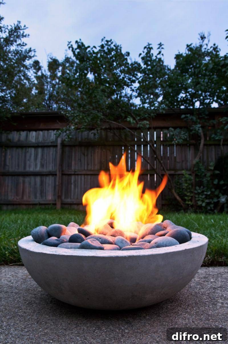 Concrete fire pit with burning fire