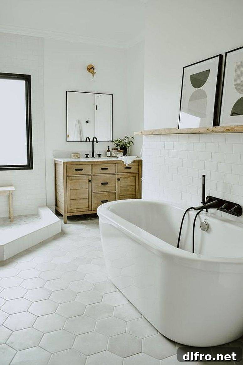 Wooden vanity and floating shelf in a modern white bathroom