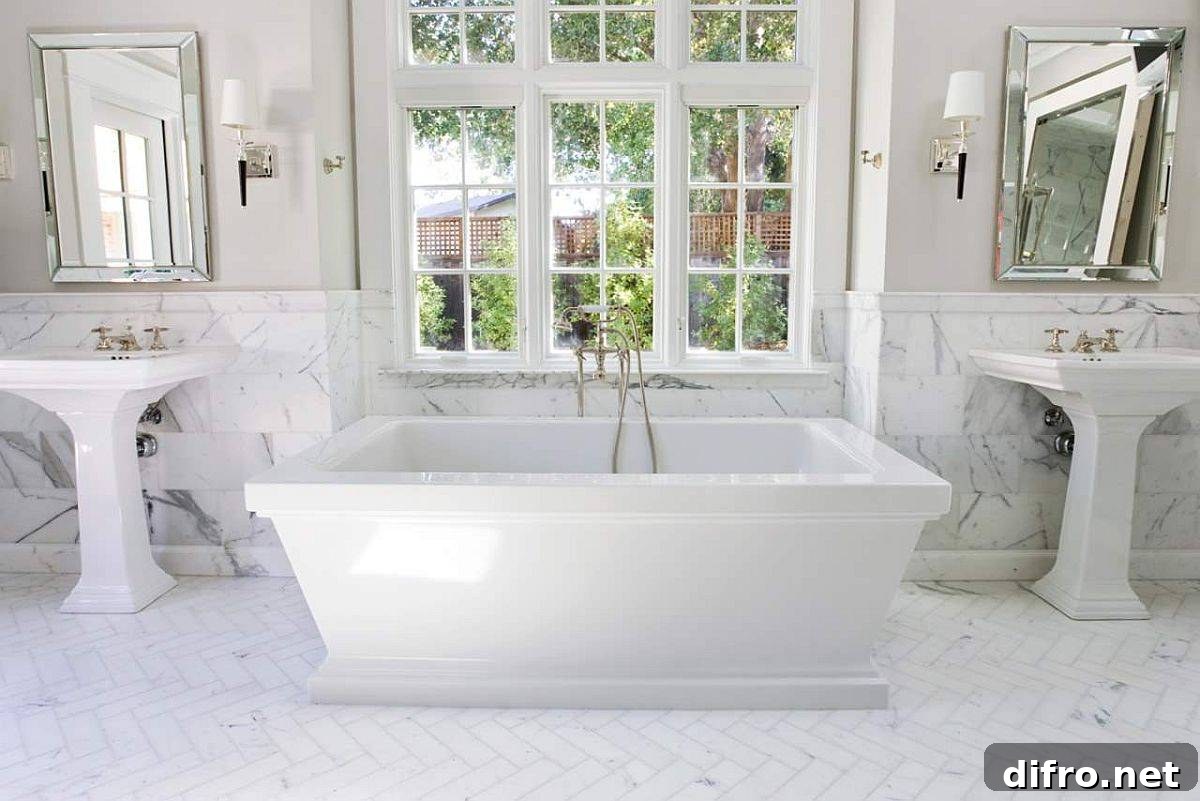 Marble adds luxury to a white bathroom
