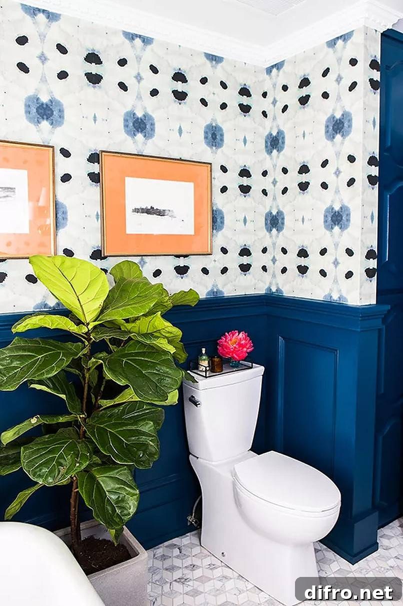 Huge plant beside toilet in blue-walled bathroom