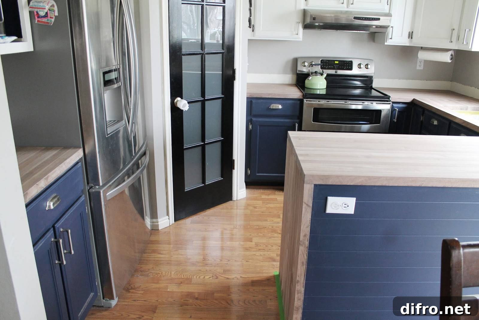 Empty kitchen counter with blue cupboards