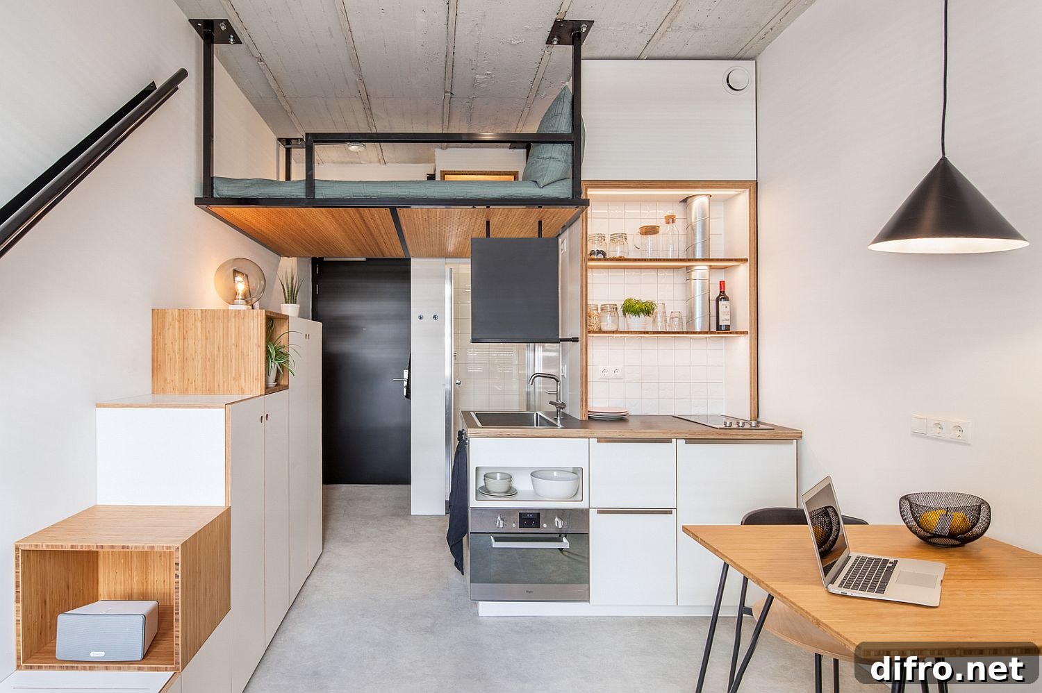 Loft bedroom in an 18 sqm apartment with wooden steps that double as storage