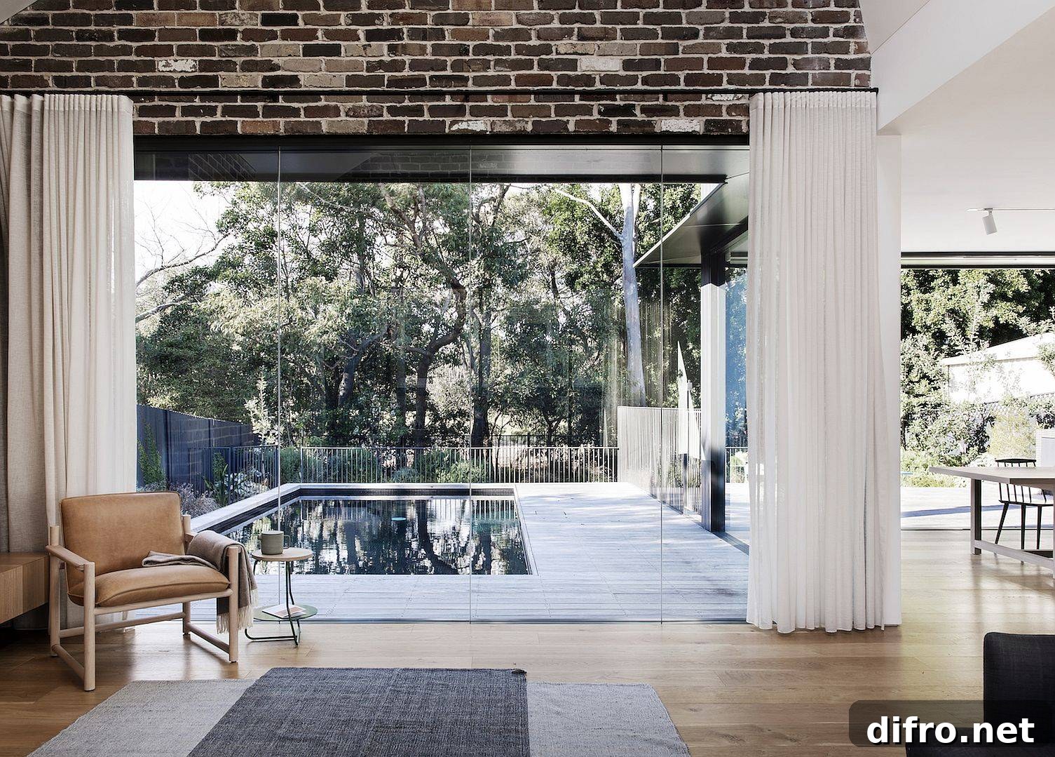 Wonderful view of the pool area and the green outdoors thanks to the floor-to-ceiling glass walls