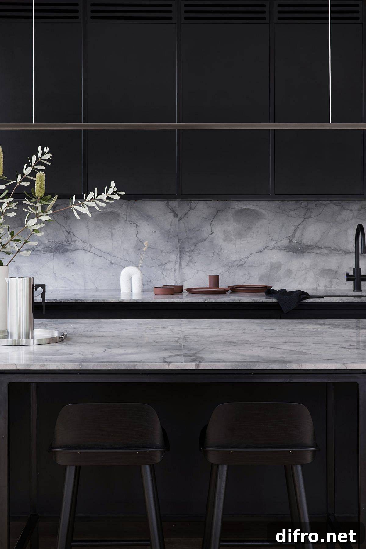 Marble adds class and elegance to the contemporary kitchen in black and white