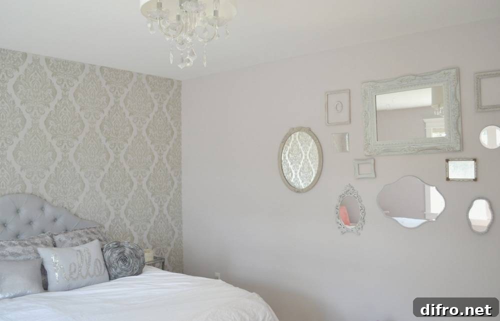 Mirrors hanging on grey bedroom wall