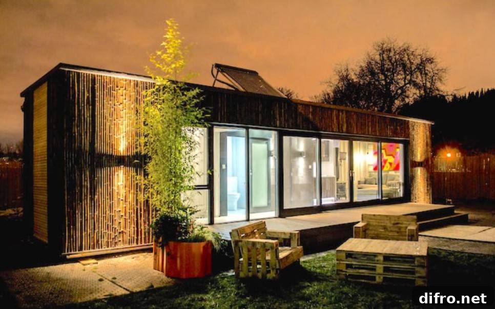Container house with glass panels