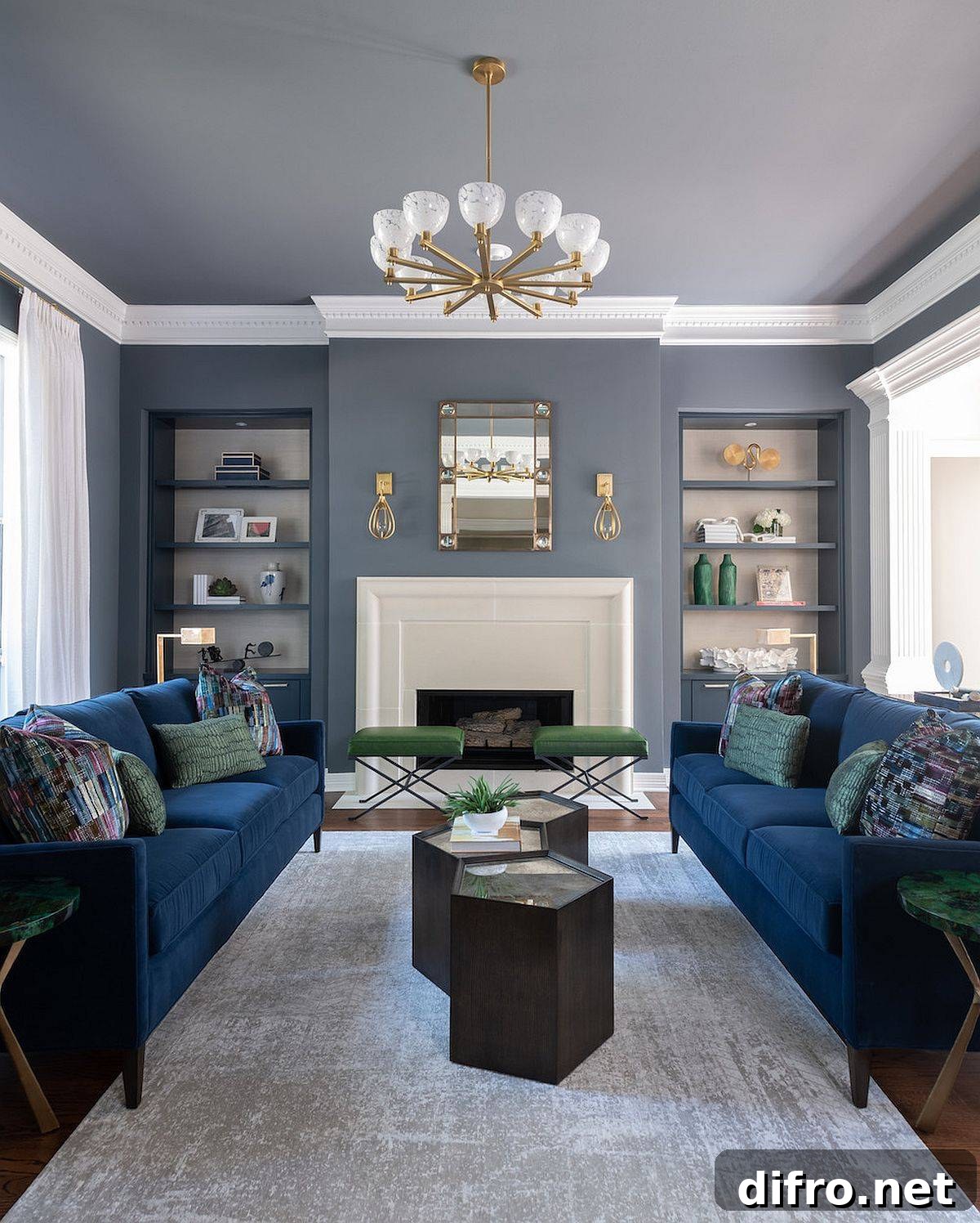 Modern living room in gray with bright blue sofas