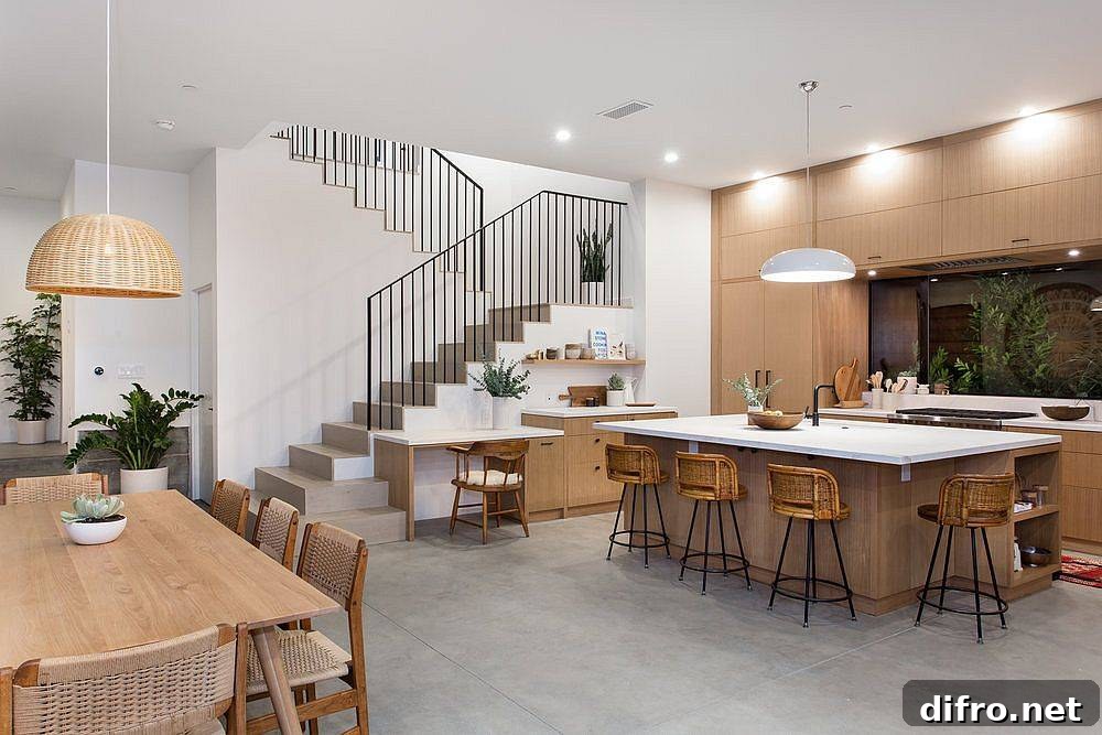 White and wood kitchen continuing into the dining area