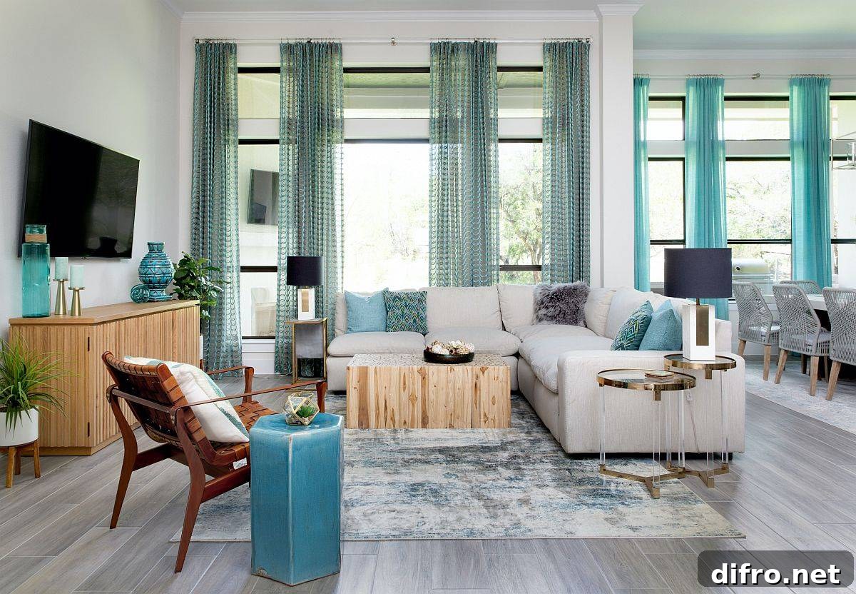 Spacious wood and white family room with blue accents
