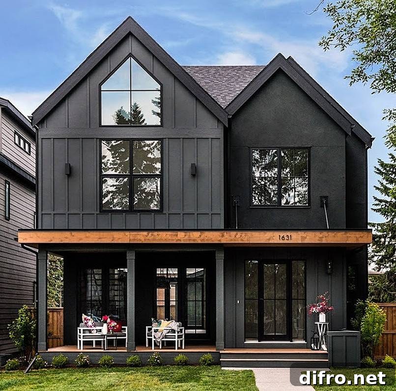 White furniture in the patio of a black house