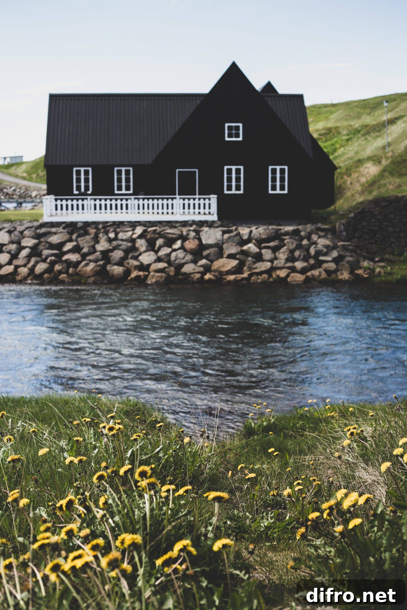 Black house by the river